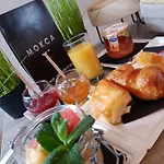 Le Mokca ميلا